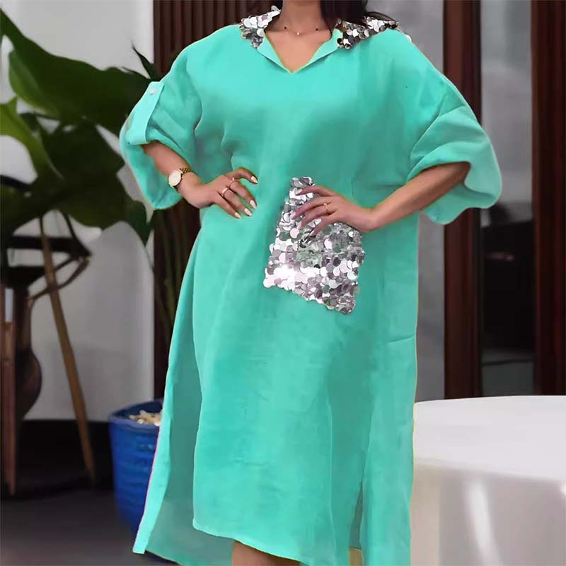 Maxi abito con cappuccio in paillettes a squame di pesce