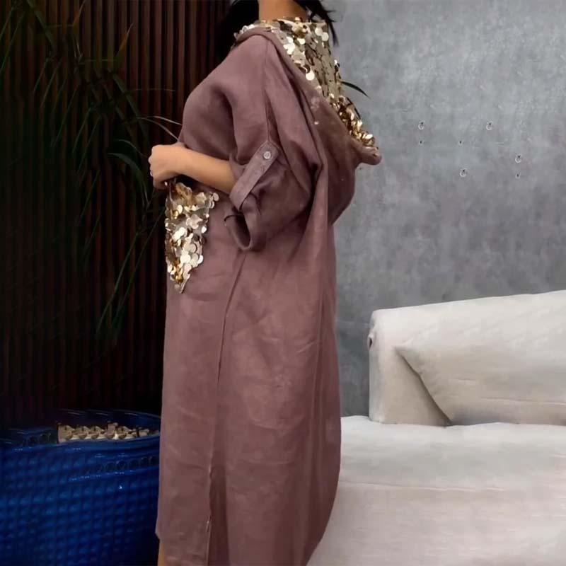 Maxi abito con cappuccio in paillettes a squame di pesce