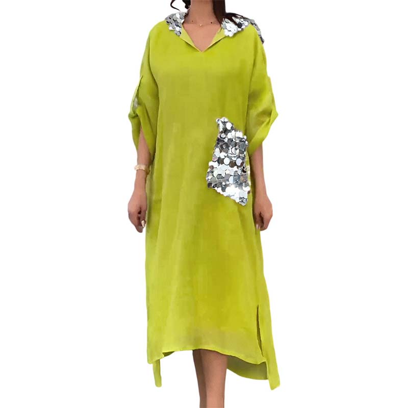 Maxi abito con cappuccio in paillettes a squame di pesce