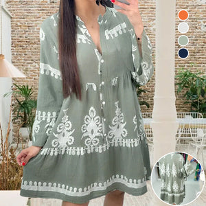 Abito babydoll abbottonato con scollo a V