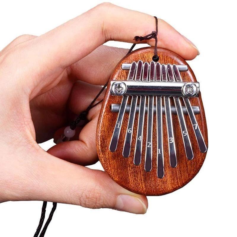 Mini pianoforte pollice