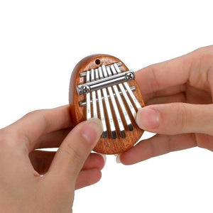 Mini pianoforte pollice
