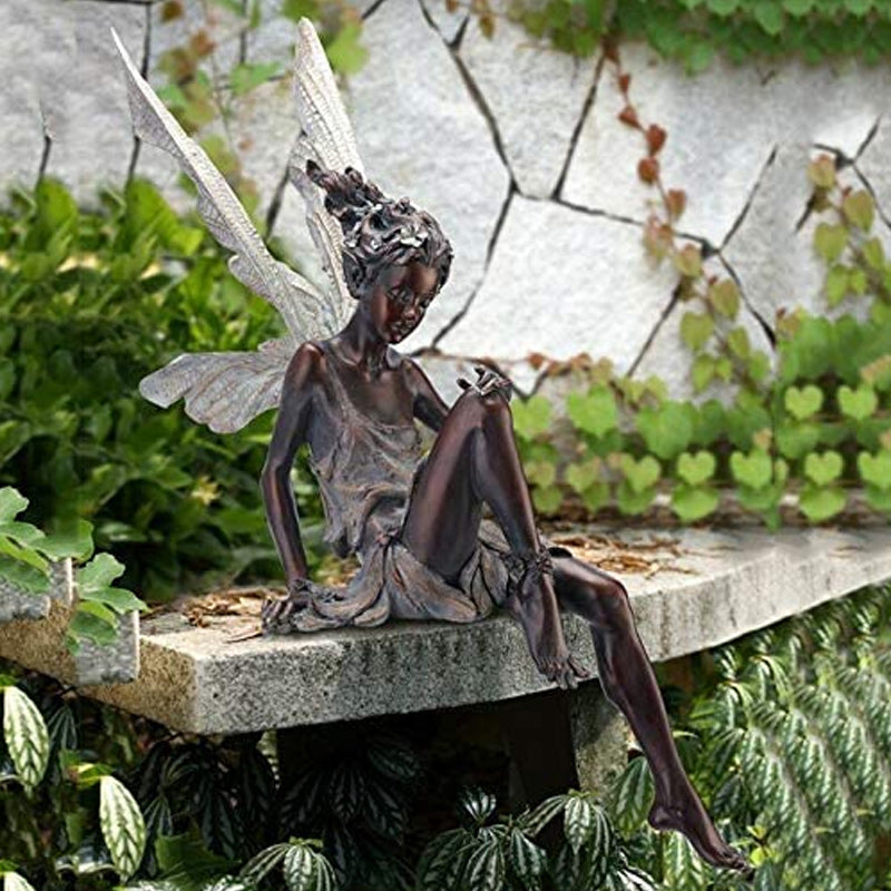 Statua del giardino delle fate sedute