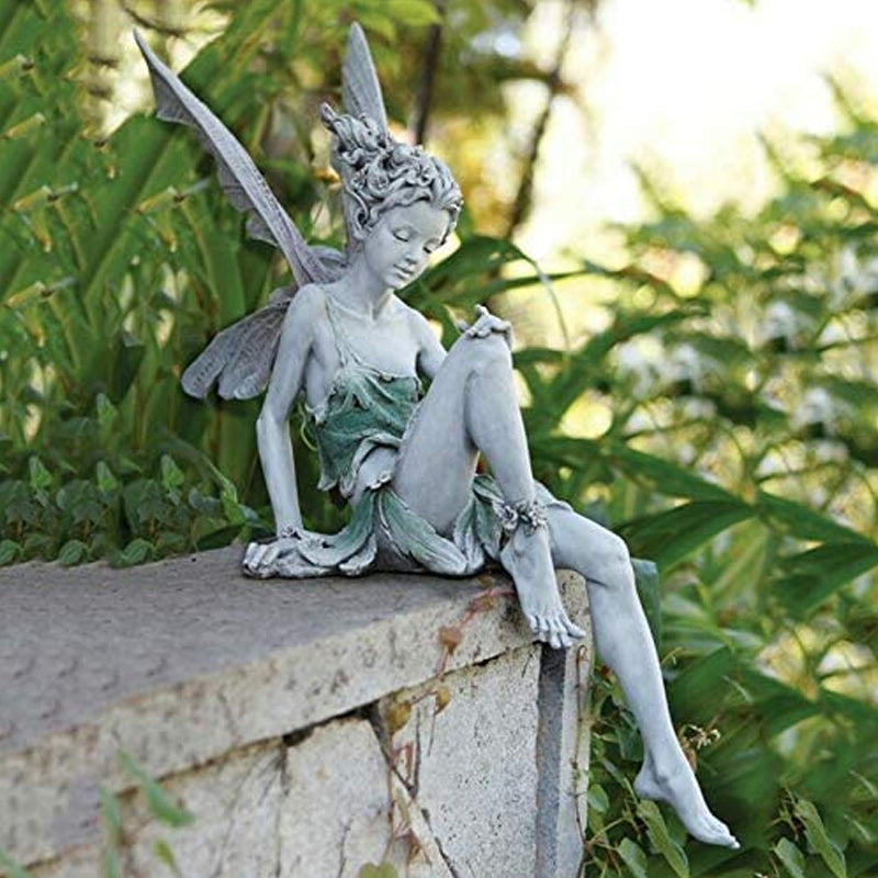 Statua del giardino delle fate sedute